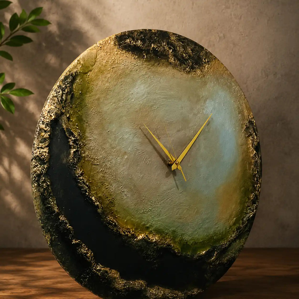 Handmade Sage Green and Gold Round Resin Wall Clock – styled view