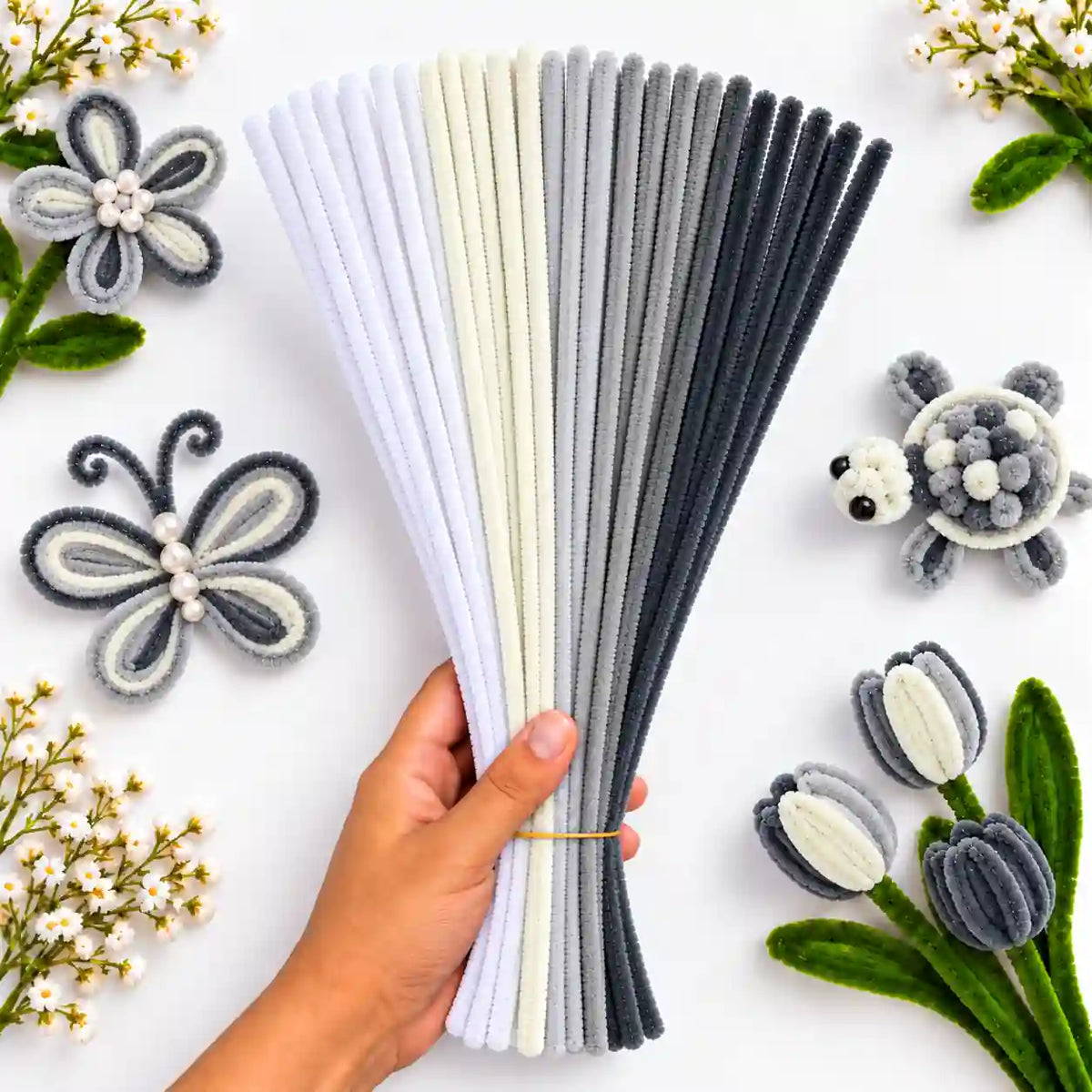 Neutral Family Mix 6 mm fluffy pipe cleaners in Black, Grey, White & Cream, with craft examples