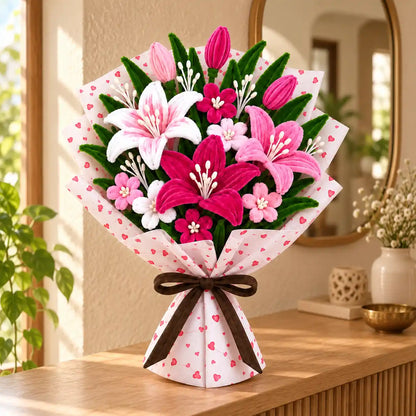 Pink handmade pipe cleaner flower bouquet displayed in a warm interior